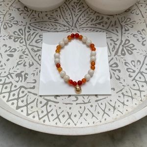 Ivory pearl bracelet with Carnelian beads